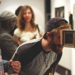 Attendees view the 'Despairoscope', by Wayne Chisnall